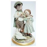 1062	CAMPIDIMONTE PORCELAIN STATUE OF YOUNG BOY AND GIRL FEEDING CHICKENS, APPROXIMATELY 11 IN H
