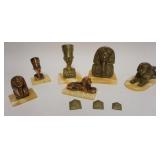 1072	GROUP OF ASSORTED EGYPTIAN METAL FIGURES MOUNTED ON MARBLE AND NEST OF BRASS PYRAMIDS, TALLEST 