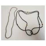 1133	2 ONYX AND GOLD NECKLACES, 1 CLASP MARKED 14K