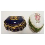 1147	2 PORCELAIN DRESSER BOXES, LIMOGES COBALT BLUE WITH GUILDED ACCENTS, COURTING SCENE AND EGG SHA
