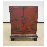 1157	ASIAN LACQUERED CHINOISERIE CABINET, DOVETAILED CASE ON CARVED LOWER BASE,  APPROXIMATELY 32 IN