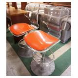 1180	MID CENTURY MODERN PAIR OF LUCITE CHAIRS ON ALUMINUM BASES, APPROXIMATEY 38 IN H. PITTING ON TH