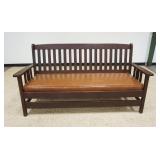 1188	MISSION STYLE OAK SETTEE WITH SLIP CUSHON VINYL COVERED SEAT, TEAR TO VINYL AND REPAIR ON REAR STREATCHER, APPROXIMATELY 77 IN X 27 IN X 39 IN H