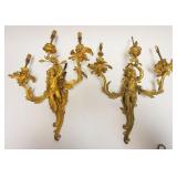 1195	PAIR OF BRONZE CHERUB WALL SCONCES, EACH APPROXIMATELY 22 IN H. SOME LOSS TO APPLIED LEAVES
