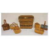 1212	ASSORTED LONGABERGER BASKETS WITH 1986 TWO PIE WITH 1987 2 TONE BASKET AND MISC BOOKING BASKETS