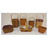 1217	ASSORTED LONGABERGER BASKETS WITH 4 PEG BASKETS 1989, 2000 1988, 1995 BEE BASKET, BERRY BASKET 