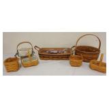 1219	ASSORTED LONGABERGER BASKETS WITH 1992 & 1993 CRISCO BASKETS AND 5 MISC BOOKING BASKETS