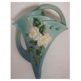 1004	ROSEVILLE POTTERY WALL POCKET, BLUE W/WHITE ROSE