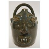 1051	CONTEMPORARY STONEWARE FACE JUG SIGNED R ANDERSON, APPROXIMATELY 9 1/2 IN HIGH
