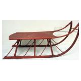 1063	PRIMITIVE WOOD CHILDS SLEIGH, APPROXIMATELY 43 IN X 15 IN X 23 IN HIGH