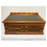 1068	JP COATS SPOOL CABINET COUNTRY STORE DESK, APPROXIMATELY 21 IN X 30 IN X 14 IN HIGH