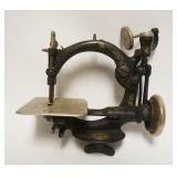 1069	ANTIQUE WILCOX & GIBBS SEWING MACHINE, APPROXIMATELY 10 1/2 IN X 6 IN X 11 IN HIGH