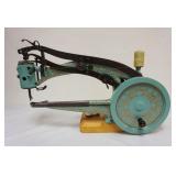 1070	ANTIQUE SEWING MACHINE, APPROXIMATELY 28 IN X 9 IN X 17 IN HIGH