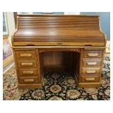 1105	OAK ROLL TOP DESK W/SWIVEL OAK CHAIR, PANELED SIDES & BACK, APPROXIMATELY 60 IN X 32 IN X 51 IN