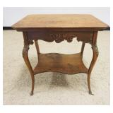 1121	ORNATE CARVED OAK LAMP TABLE W/METAL MOUNTS, APPROXIMATELY 24 IN X 30 IN X 30 IN HIGH