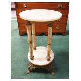 1122	ONYX PEDESTAL HAVING 4 COLUMNS AT CENTER MOUNTED ON ORNATE CAST METAL BASE, APPROXIMATELY 16 IN