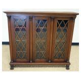 1125	DIMINUTIVE EMPIRE STYLE WALNUT BOOKCASE, 3 DOOR W/CORINTHIAN HALF COLUMNS, LATTICE GRILL DOOR F