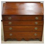 1143	ANTIQUE CHERRY DOVETAILED SLANT FRONT DESK W/OVAL PENCIL INLAY DRAWER FRONTS, 4 DRAWER, APPROXI