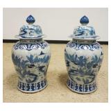 1029	ASIAN BLUE & WHITE FLOOR VASES/COVERED URNS W/IMAGES OF PEOPLE IN VILLAGE, EACH APPROXIMATELY 3