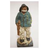 1041	CAST IRON *OLD SALTY* FISHERMAN, APPROXIMATELY 7 IN HIGH
