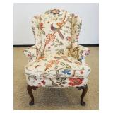 1123	UPHOLSTERED HIGH BACK WING CHAIR WITH IMAGES OF BIRDS PERCHED ON FLORAL BRANCHES