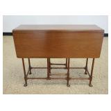 1130	PETETE NARROW MAHOGANY GATE LET TABLE WITH PENCIL TURNED LEGS AND CLUB FEET, APPROXIMATELY CLOS