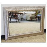 1142	BEVELED EDGE HANGING MIRROR IN TEXTURED WOOD FRAME WITH GILT SILVER FINISH, APPROXIMATELY 46 IN