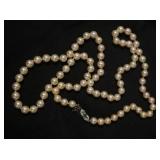 1217	LADIES PEARL NECKLACE WITH VINTAGE GREEN STONE CLASP, MARKED ON CLASP