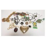 1219	MISCELLANEOUS JEWELRY AS FOUND, NECKLACES, RINGS, PINS, PAPER WEIGHT, ETC