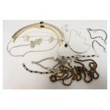 1142	10 ASSORTED LADIES NECKLACES, SOME WITH MATCHING EARRINGS, BRACELET OR WATCH. 1 STERLING