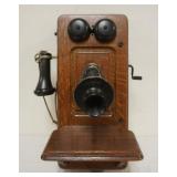 1154	ANTIQUE OAK KELLOG WALL MOUNT STICK PHONE, APPROXIMATELY 9 IN X 10 IN X 20 IN H