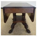 1161	EMPIRE MAHOGANY DROP LEAF TABLE, TABLE HAVING 4 CARVED COLUMNS AND CARVED CLAW FEET AT BASE, AP