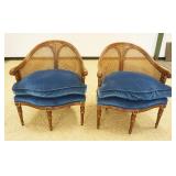 1178	PAIR OF ORNATE CANE BACK ARM CHAIRS WITH FLORAL CARVED CREST AND REEDED COLUMN LEGS, LOSS TO CA