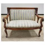 1200	MAHOGANY UPHOLSTERED EMPIRE STYLE SCROLLED ARM LOVE SEAT, APPROXIMATELY 45 IN X 24 IN X 36 IN H
