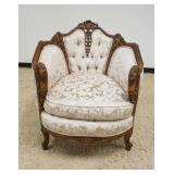 1204	ORNATE PIERCED CARVED WALNUT ARM CHAIR WITH TUFTED UPHOLSTERED SIDE AND CARVED FLOWERS IN URNS 