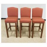 1205	3 ALL UPHOLSTERED BAR STOOLS WITH METAL LINED RAIL FRONT, EACH APPROXIMATELY 16 IN X 18 IN X 46
