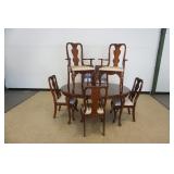 1208	BROYHILL CHERRY DINING TABLE WITH 2 LEAVES AND 6 CHAIRS, TABLE APPROXIMATELY 62 IN X 44 IN X 30