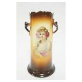 1040	WARWICK PORCELAIN DOUBLE HANDLED VASE W/IMAGE OF YOUNG WOMAN W/FLOWERS, APPROXIMATELY 10 1/2 IN
