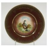 1042	ROYAL VIENNA HAND PAINTED PLATE W/IMAGE OF BIRD IN CENTER, GILT TRIM W/BROWN BORDER, APPROXIMAT