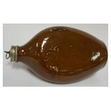 1074	STONEWARE BROWN GLAZED FOOT WARMER, APPROXIMATELY 13 IN H