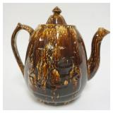 1075	ROCKINGHAM LARGE REBECCA AT THE WELL TEA POT, APPROXIMATELY 12 IN H, CHIP ON LID