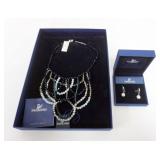 1093	SWARIVSKI CRYSTAL JEWELRY, MUTI COLORED DRAPE NECKLACE IN BOX AND CRYSTAL EARRINGS IN BOX