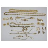 1094	GROUP OF GOLD TONE JEWELRY INCLUDING 8 PAIRS OF EARRINGS, 5 BRACELETS, 3 NECKLACES AND A PIN