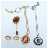 1097	ASSORTED CAMEOS INCLUDING STERLING RELIGIOUS NECKLACE, CAMEO STICK PIN, CAMEO EARRING AND CAMEO