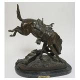 1118	CONTEMPORARY REMINGTON BRONZE *WICKED PONY* ON MARBLE BASE, APPROIMATELY 20 IN X 10 IN X 23 IN 