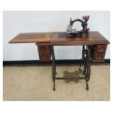 1160A	ANTIQUE WILCOX & GIBBS TREADLE SEWING MACHINE
