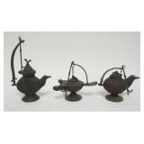 1043	GROUP OF BRONZE OIL LAMPS, LARGEST APPROXIMATELY 8 IN