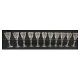 1051	11 ELEGANT ETCHED GLASS WINES, EACH APPROXIMATELY 6 1/2 IN HIGH