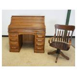 1095	DIMINUATIVE OAK ROLL TOP DESK WITH PANELED SIDES AND FOLD OUT WINGS AND DESK CHAIR, CHAIR HAS 1