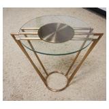 1128	MODERN STYLE GLASS TOP LAMP TABLE WITH GEOMETRIC STYLE BASE, APPROXIMATELY 24 IN X 18 IN X 22 I
